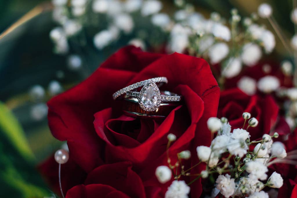 Diamond Engagement Rings on a Red Rose