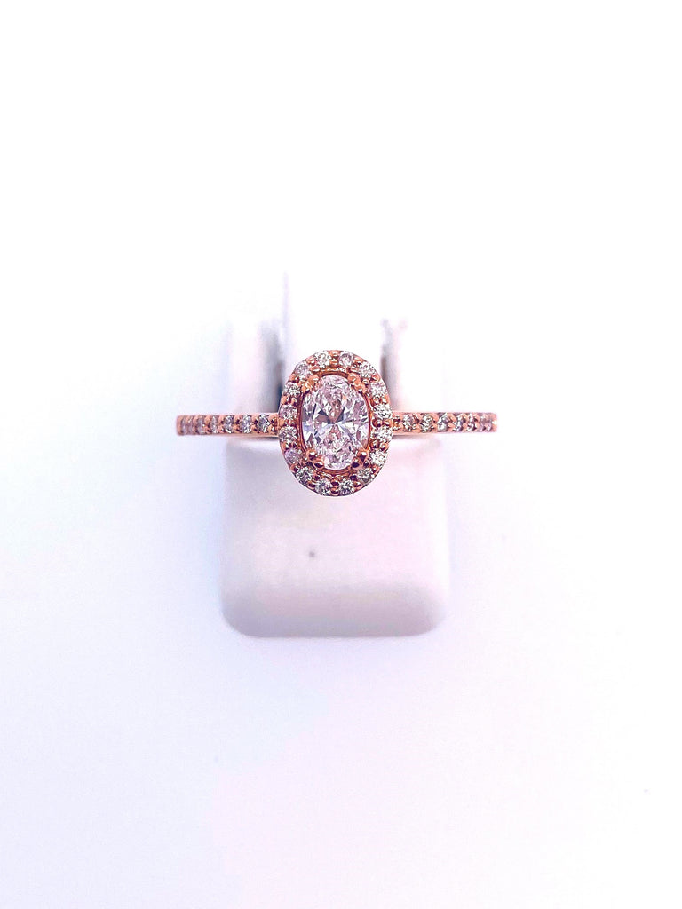 Halo Style in 14 Karat Rosé Oval Shaped Diamond Engagement Ring - MJ Christensen Diamonds