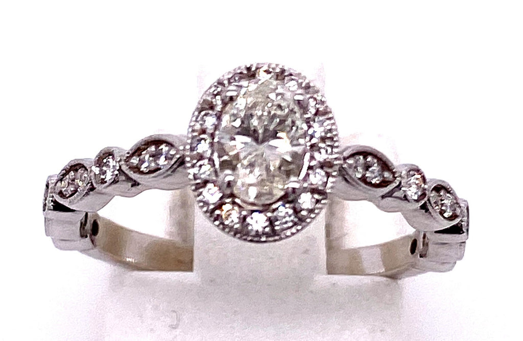 Halo Style in 14 Karat White Oval Shaped Diamond Engagement Ring - MJ Christensen Diamonds